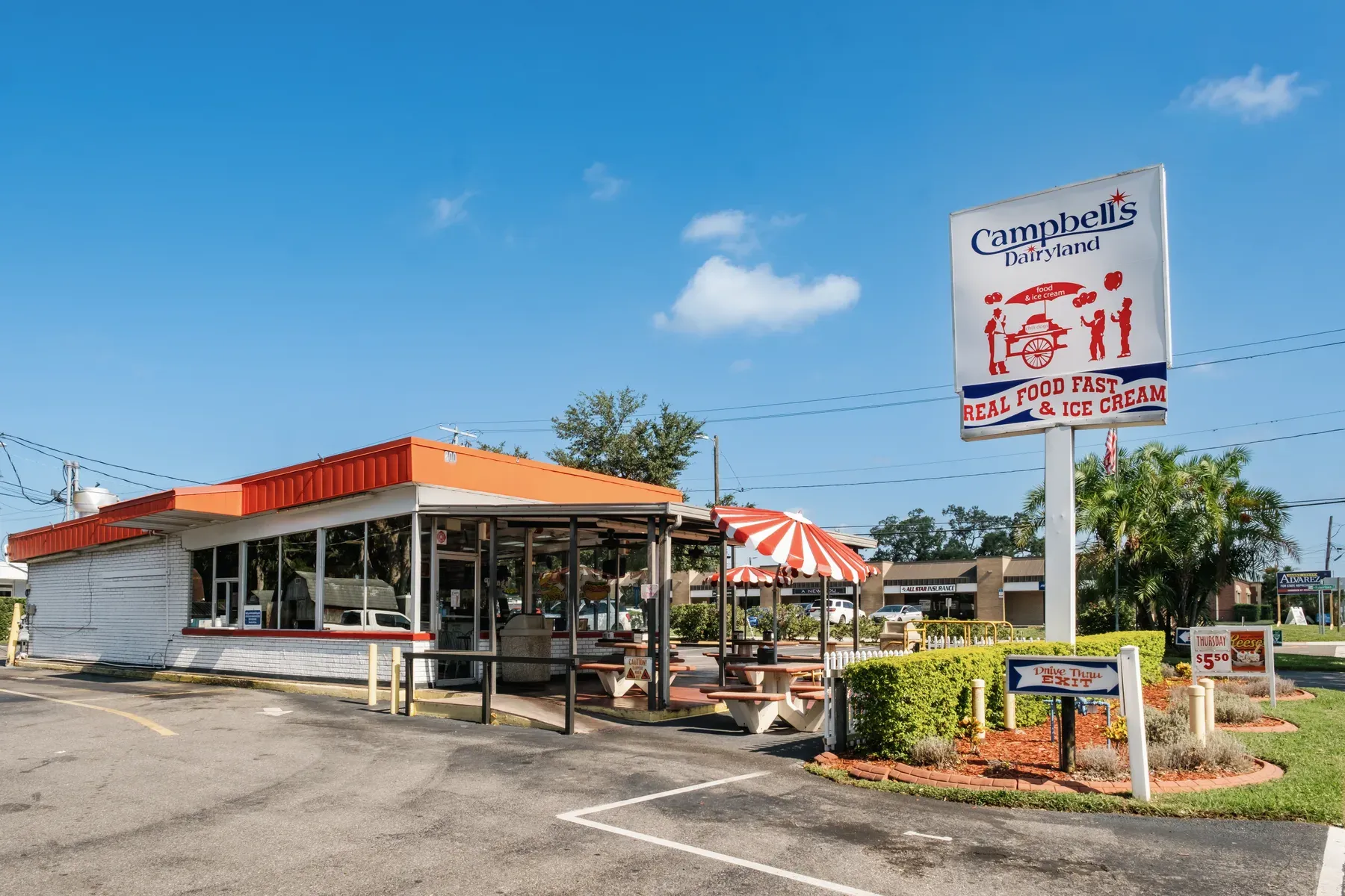Campbell's Dairyland restaurant exterior, patio, and roadside sign